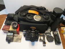 Canon A-1 Package / Leather case w/Power Winder / 50mm, 28mm Lenses