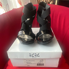 BCBG Paris Women  s Black Patent Leather elastic Strappy Open Toe Zip Heels - 9