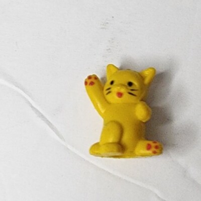 Vintage rubber eraser cat figurine yellow
