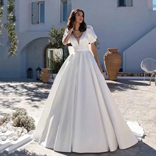 White Satin Wedding Dresses with Pockets Short Sleeves Puff Backless Bridal Gown