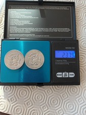 Set 2 monete mezzo Dollaro "Kennedy"-Argento 1964 e 1969-vedi descrizione-ottime