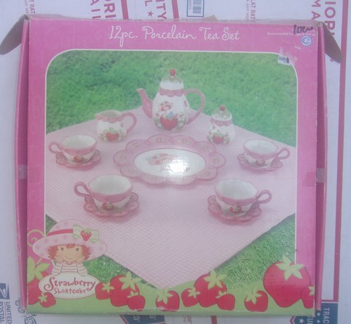 STRAWBERRY SHORCAKE 12 PIECE PORCELAIN TEA SET IN BOX IN VERY GOOD CONDITION