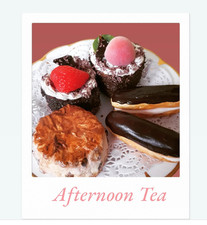 Fancy selection faux display cakes. Afternoon tea selection.
