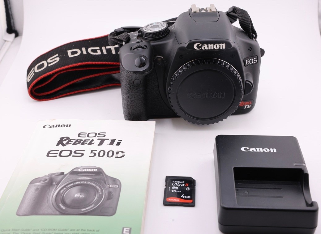 shutter only 10K (10%) Canon EOS Rebel T1i 500D 15.1 MP Digital SLR Camera Body