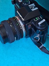 olympus om 40 camera & lens full working order, film tested, photos available.