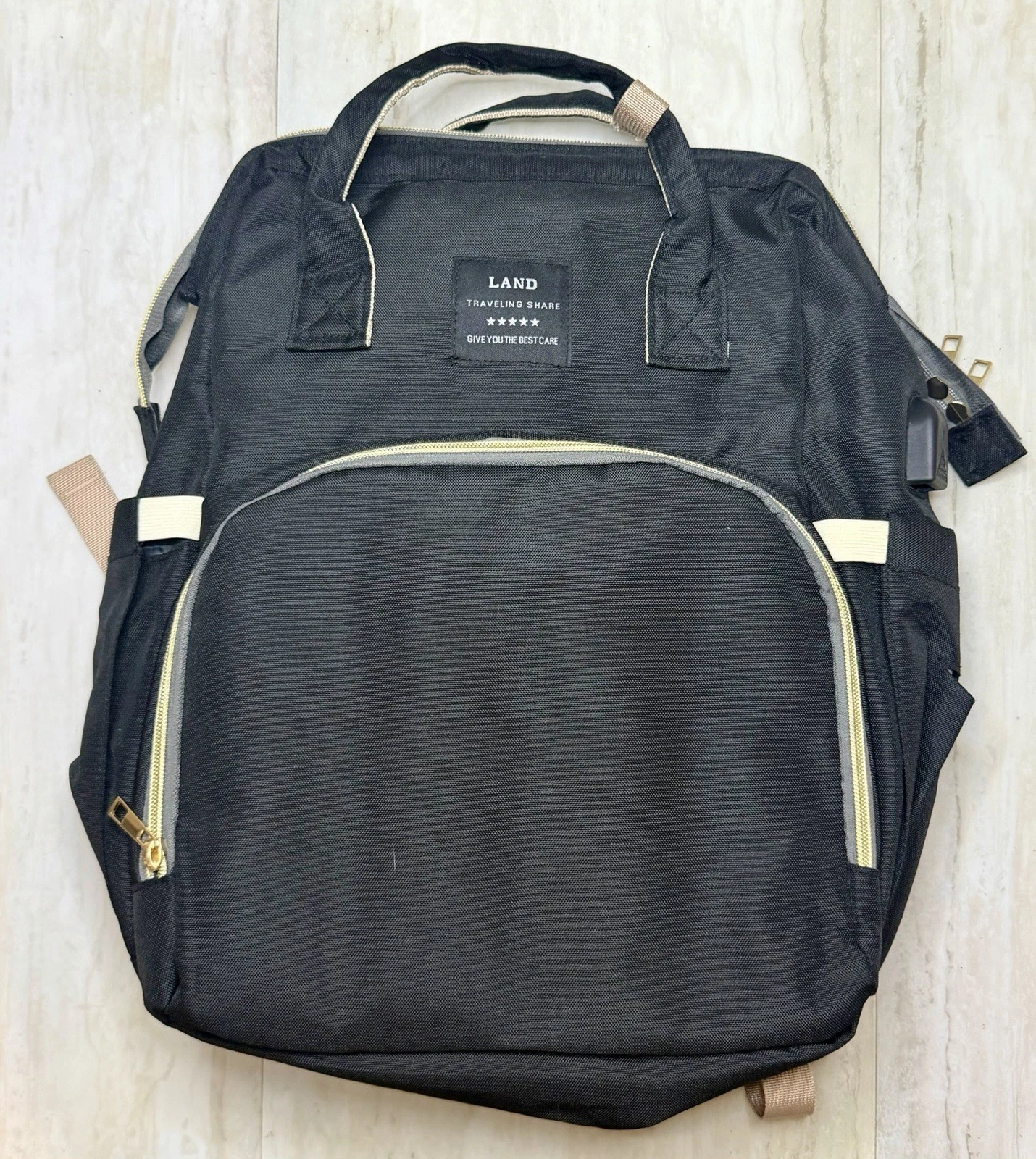 LAND Traveling Share Diaper Bag Backpack with Fold Out Changing Pad Crib Black