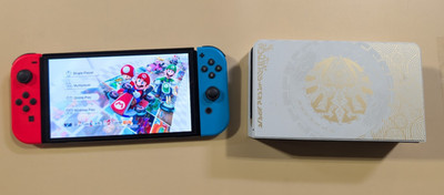 NINTENDO SWITCH HANDHELD OLED WITH DOCK AND GAMES