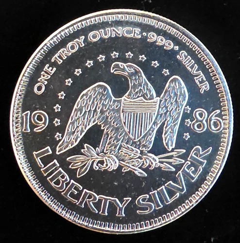 1986 A-Mark Liberty Mint Eagle Bell Shield Rare Bullion-0.999 Silver 1 Oz Coin