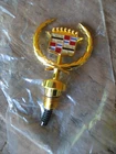 NOS 1980s-1990s Cadillac Deville Fleedwood GOLD hood ornament 25536828 NO BOX
