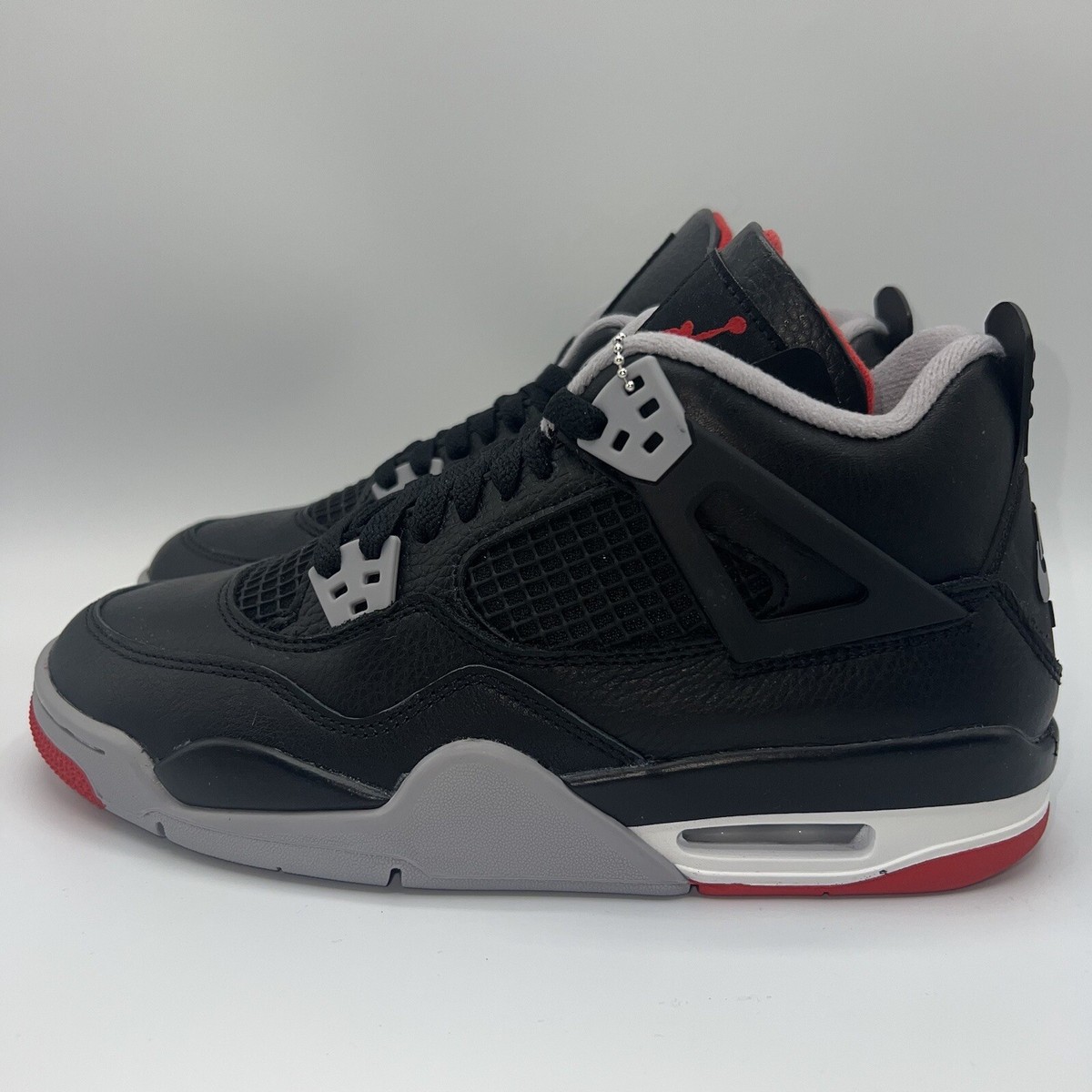 靴 Nike Air Jordan 4 Retro Bred Reimagined Air Jordan 4 Retro 'Bred Reimagined' Older Kids' Shoes. Nike ID