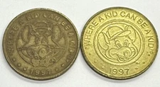 (2) types 1997 CHUCK E CHEESE TOKENS BRASS Pizza Time Theatre Showbiz  CEC