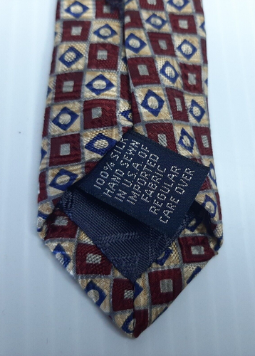 Cravatta Rountree & Yorke 100% seta marrone oro blu motivo geometrico - Foto 7 di 10