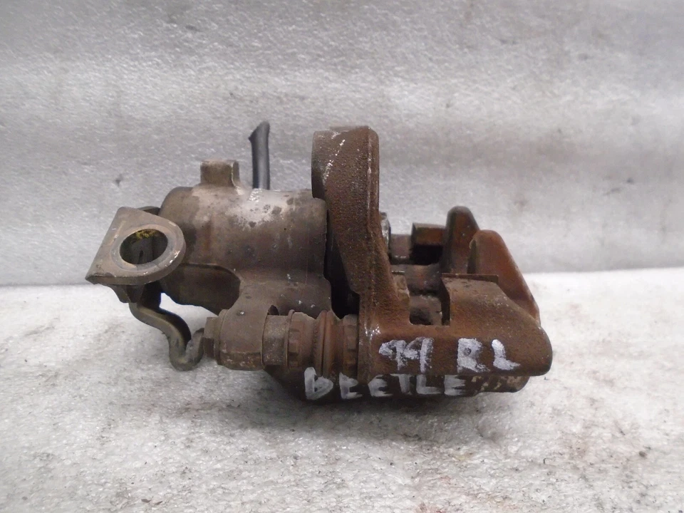 Pinza de freno trasera izquierda del lado del conductor Volkswagen Beetle 1998-2000 OEM DK903376 Foto 4 de 4