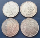 4 - 1886 Morgan Silver Dollars. BU