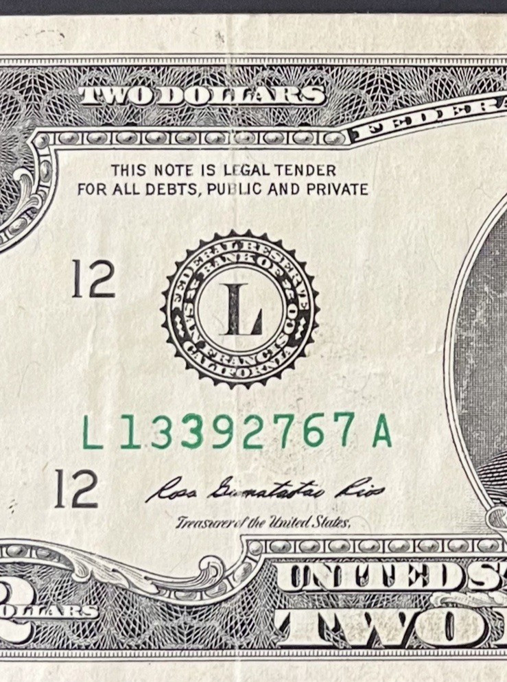 ERROR $2 DLL BILL - OVERINK ON SERIAL #: "3" & WET INK TRANFER ON MARGINS, CIRC.