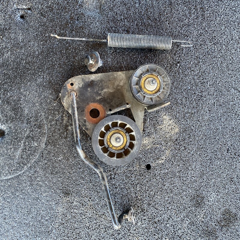 John Deere L100 L110 L108 L118 L111 L120 L130 idler pulley tensioner bracket