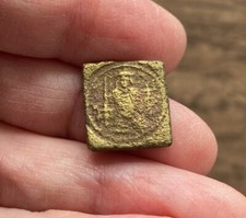16TH CENTURY ANTWERP BRASS COIN WEIGHT.