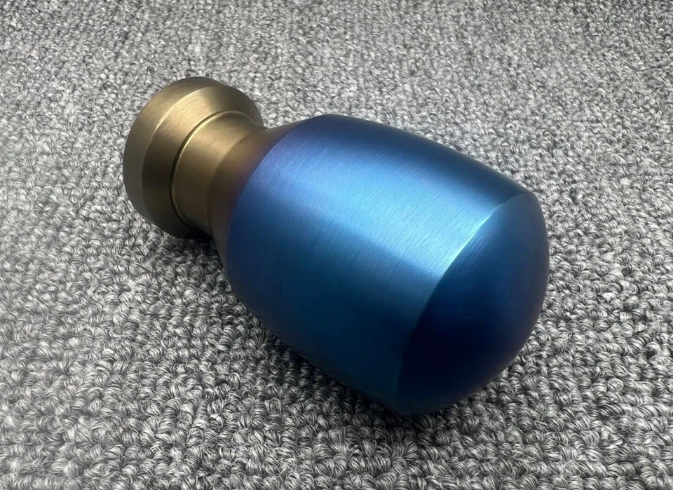 Cuchara deportiva estilo titanio forma ovalada aluminio perilla de cambio de marchas ponderada Foto 2 de 4