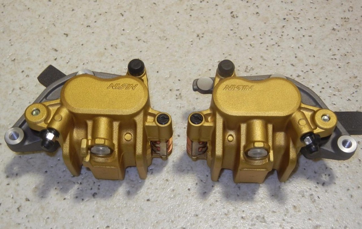 some Honda Transalp, Africa Twin, CBR, Nissin gold NOS PAIR front