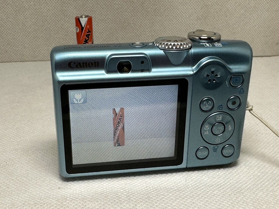 Canon PowerShot A1100 IS 12.1MP Digital Camera Silver FOR PARTS ONLY AS