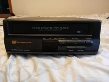 White Westinghouse Video Cassette Player VCR WVCP-8000 Powers On Read Descrip.
