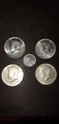 1964 Kennedy Half Dollar coin plus four Bonus Coins.