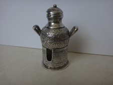 Egyptian solid silver miniature dual handled pot and burner.
