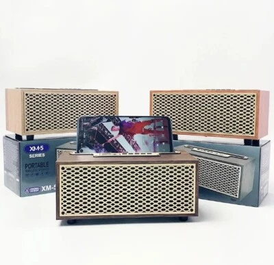 Enceinte bluetooth portable en bois avec support de téléphone et son stéréo. - Photo 1/3