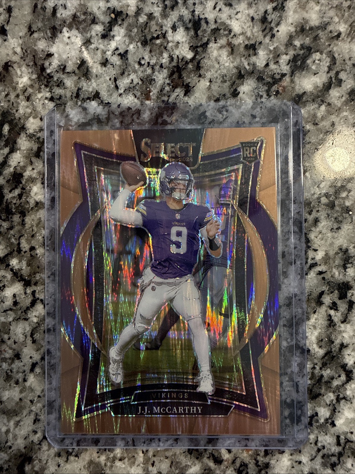 2024 Panini Select - Concourse J.J. McCarthy #24 Copper Shock Prizm /299 (RC)