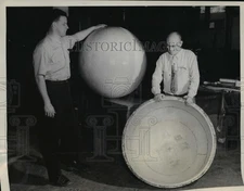 1955 Press Photo Naval Research technicians display sphere of Koppers Dylite