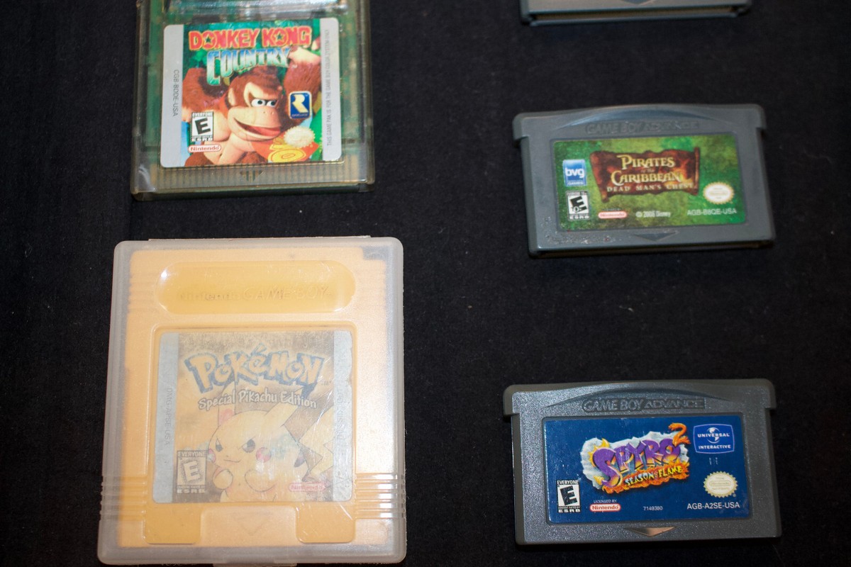 Nintendo GameBoy Advance SP Flame Red w/ 7 Games, Charger and Case