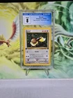 2000 Pokemon Team Rocket 1st Edition #55 Eevee CGC 8 NM mint+ TCG
