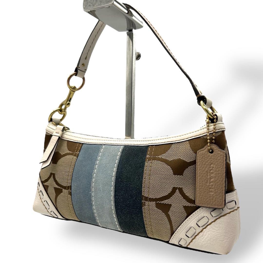 2006 Coach signature canvas and leather accessory pouch style QO685C