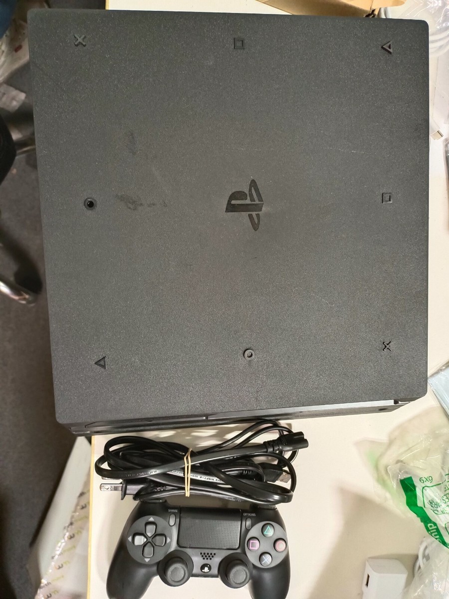 Sony PlayStation 4 Pro 2TB Console with one controller - Black