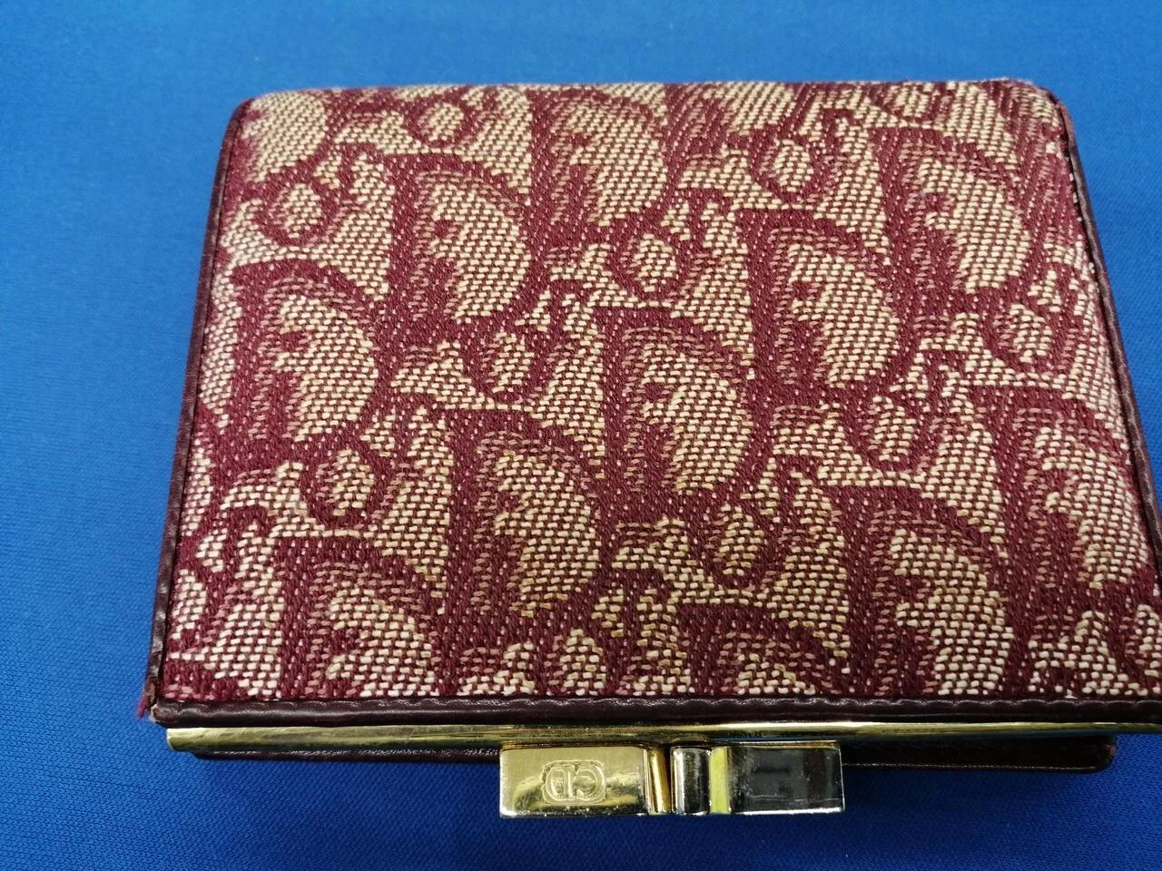 Portefeuille Christian Dior bi pli motif trotteur couleur rouge sac à main du Japon