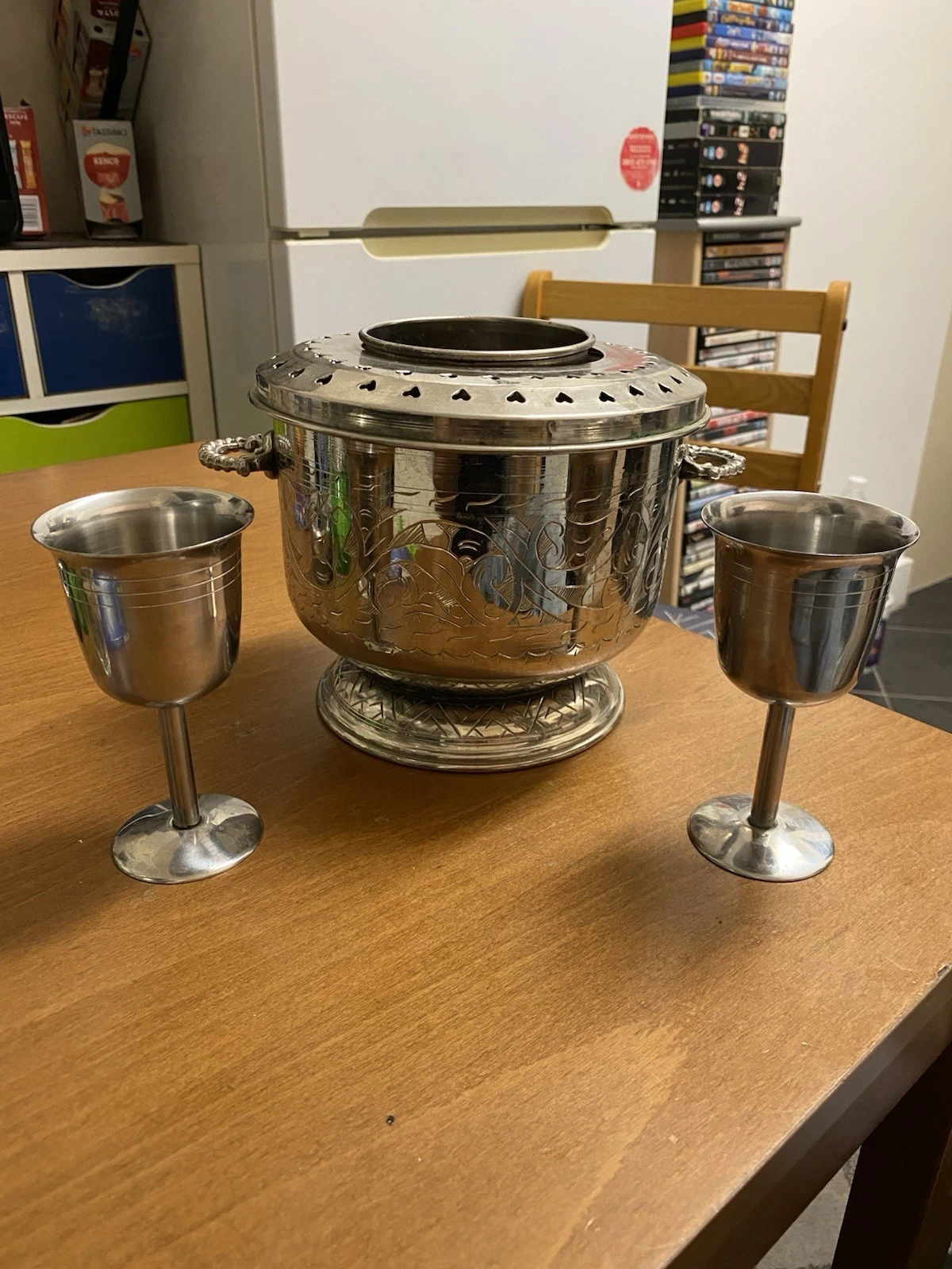 beverage cooler, featuring a removable lid with heart-shaped holes.