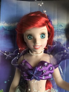 the little mermaid special edition brass key porcelain doll