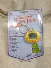 Tamagotchi Dinkie Dino Jaune – Jeu électronique Vintage Pour Collection