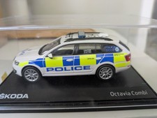 Listing image for 1/43 custom Code 3 Skoda Octavia police car model (West Midlands Police, used)