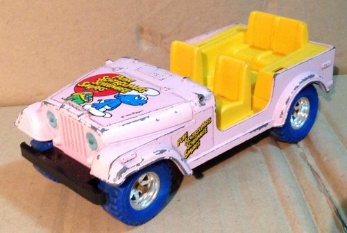 BBURAGO BURAGO 1/24 JEEP CJ-7 PUFFI SCHTROUMPF SMURF SCHLUMPF peyo 1982 cartoon - Foto 1 di 2