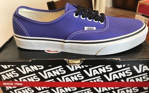 white and purple vans