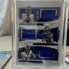 2024 Panini National Treasures NFL Gear Trio Rams Stafford Corum Nacua /99