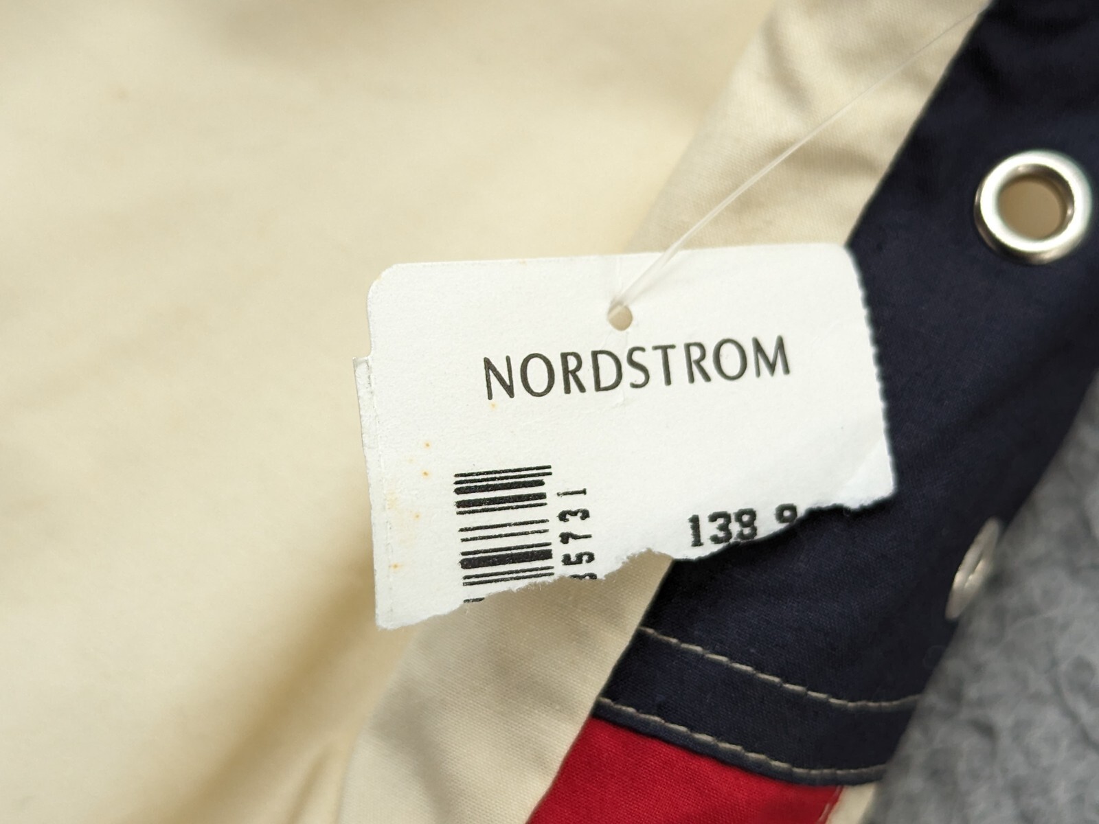 White Faconnable Vest women’s medium with navy, red, and cream nautical quilt pattern, barcode, and size 138.