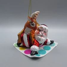 Katherines Collection Santa & Reindeer PLAYING TWISTER Glass Christmas Ornament