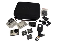 Go Pro Hero4 silver + extras! 3 batteries case trigger etc.