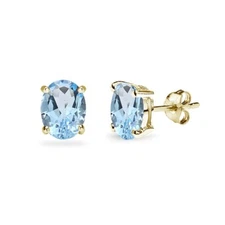 Gold Flashed Sterling Silver Blue Topaz 7x5mm Oval-Cut Solitaire Stud Earrings