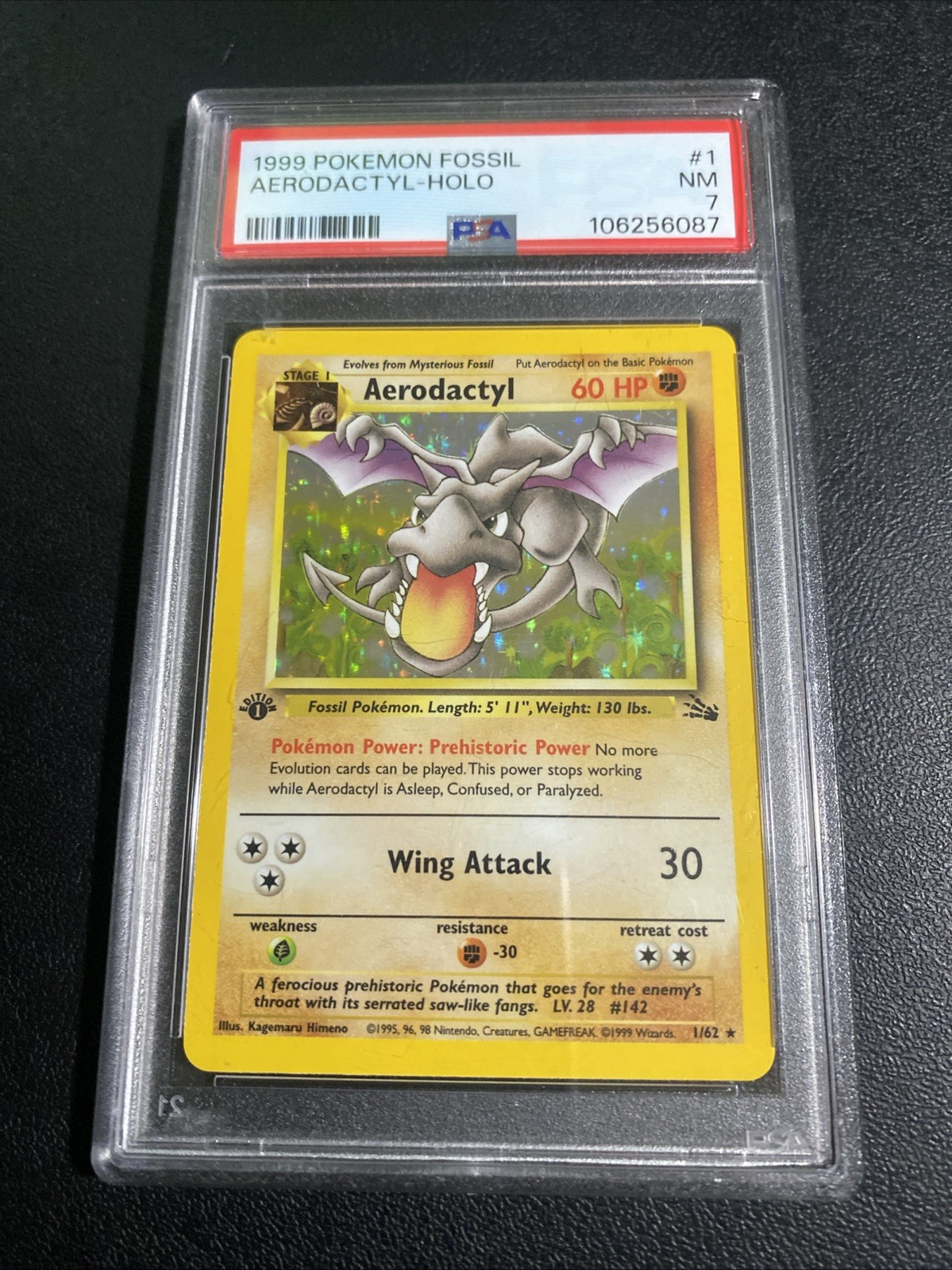 Pokémon 1999 Fossil Aerodactyl Holo 1st Edition PSA 7 Card 14/62