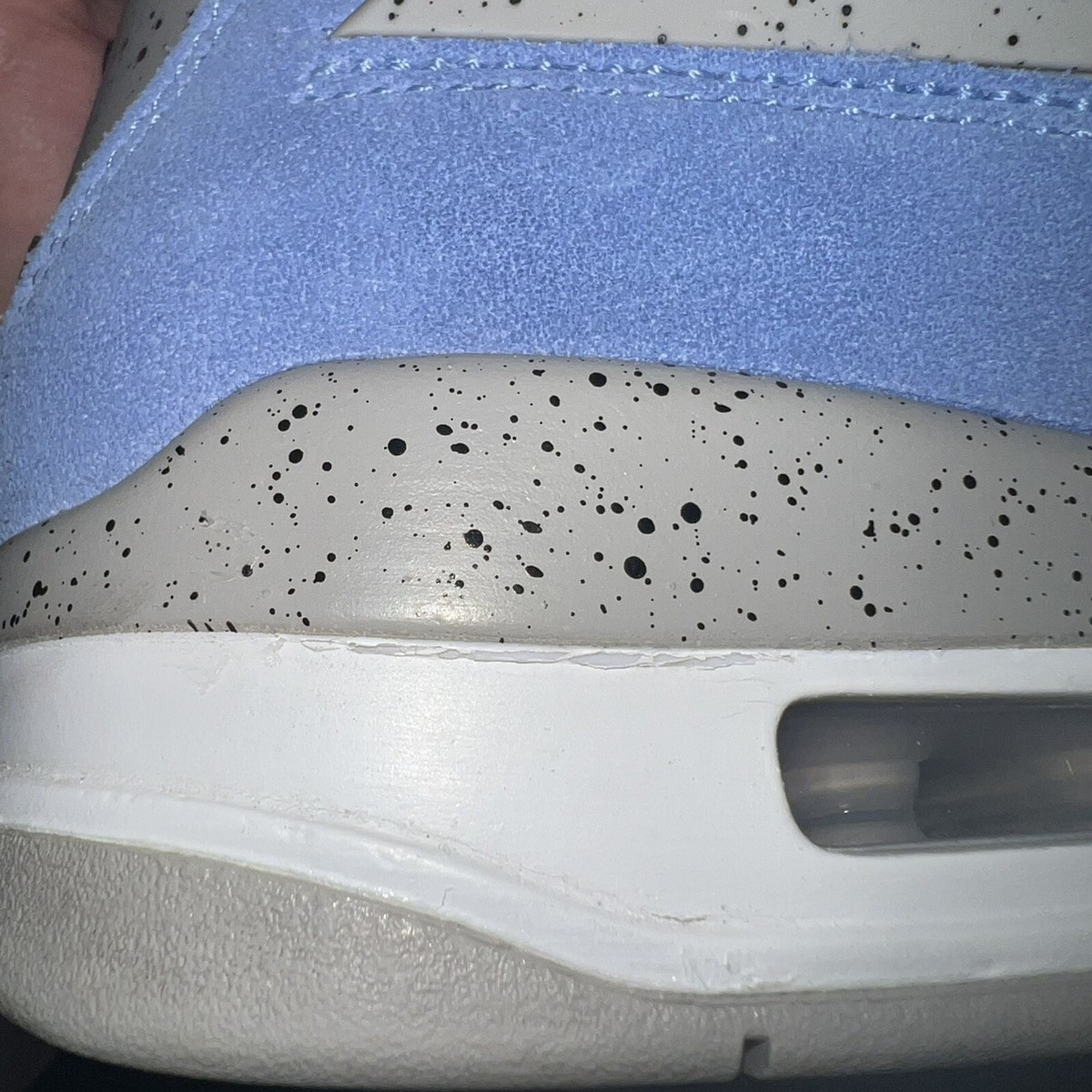 university blue jordan 4 fake vs real