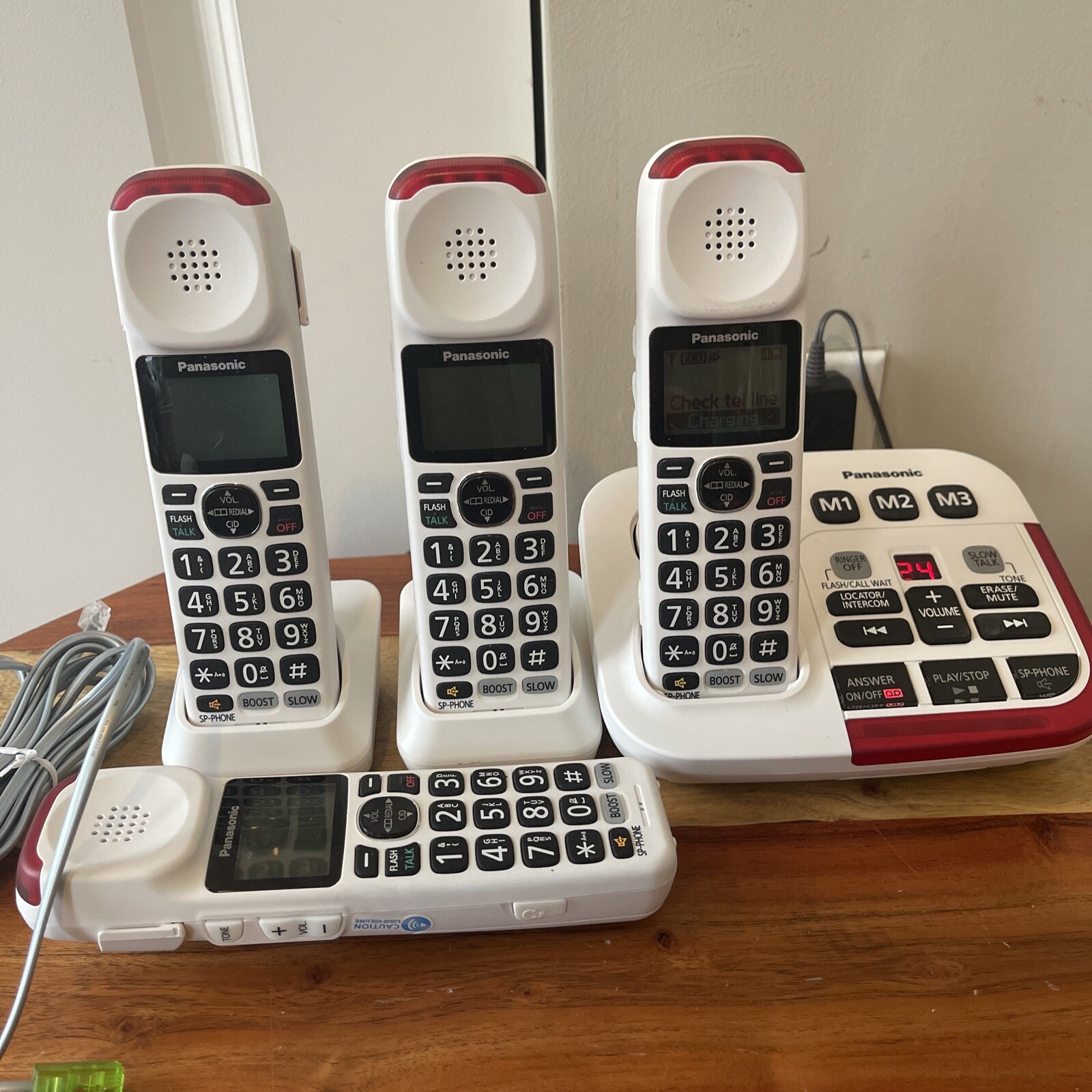 Panasonic KXTGM420W base with Four KXTGMA44W Amplified Cordless Phone