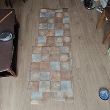 Two Lino Flooring offcuts.
